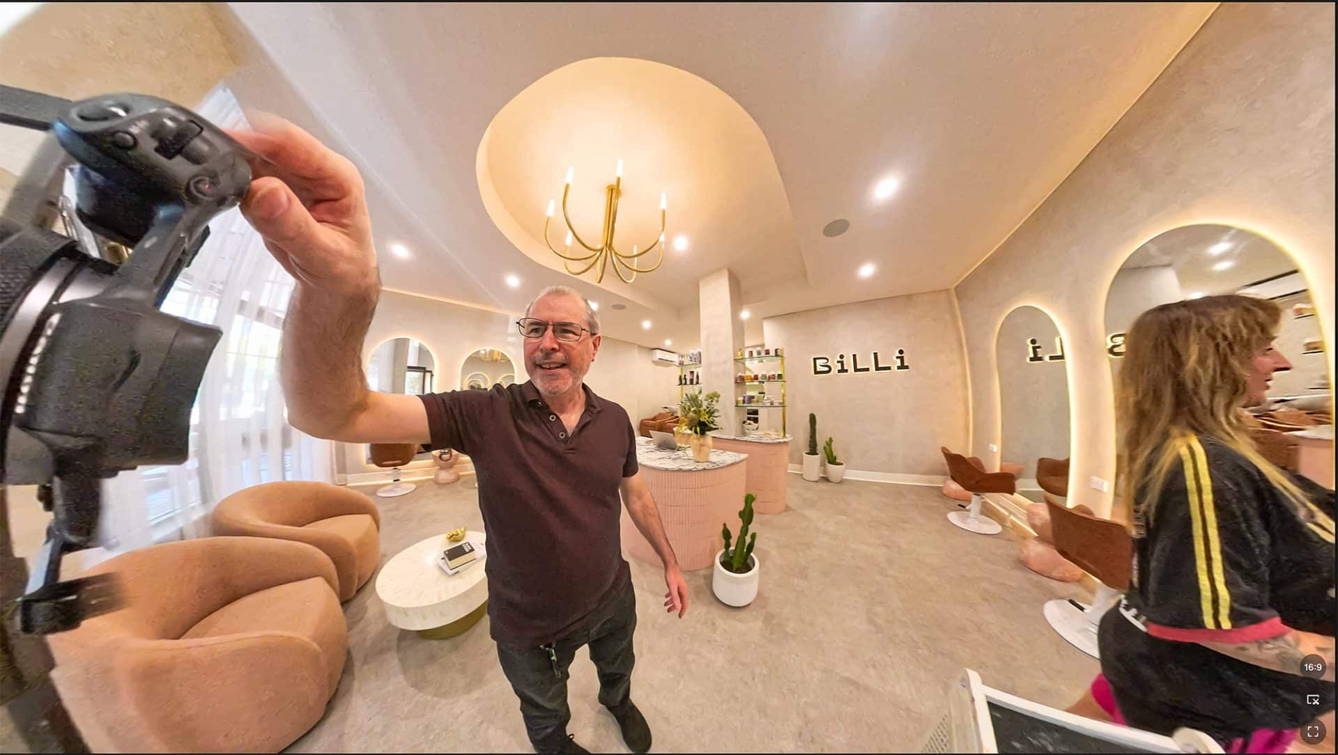 Marc Charette shooting a virtual tour at a salon in East Gosford 