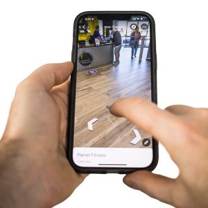 mobile phone being used to navigate a virtual tour